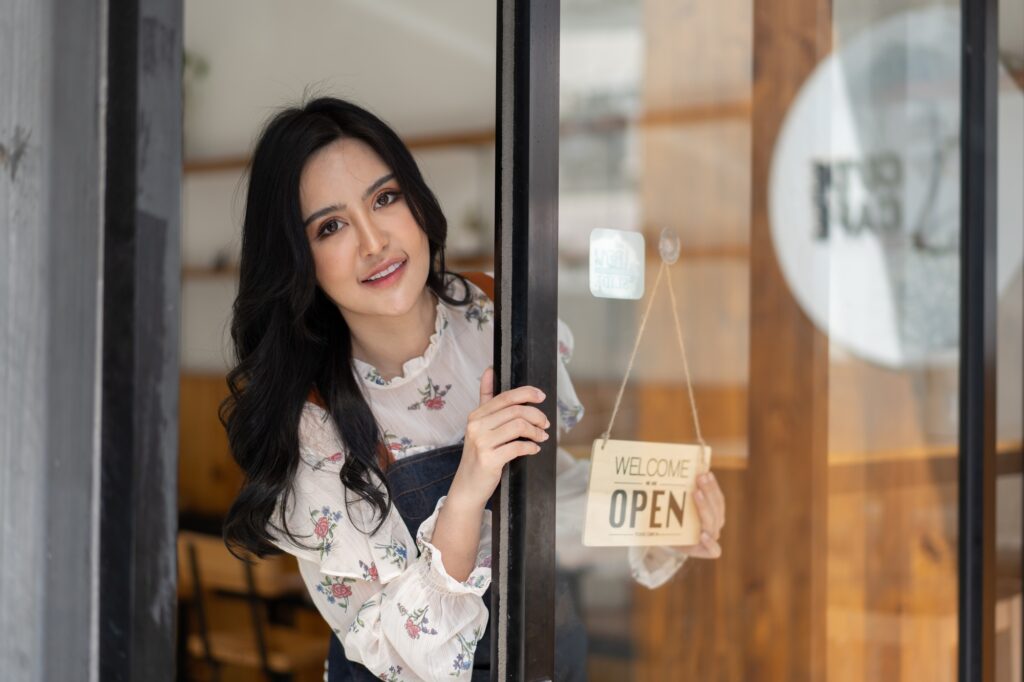 Portrait of asian woman barista cafe owner. SME entrepreneur seller business concept